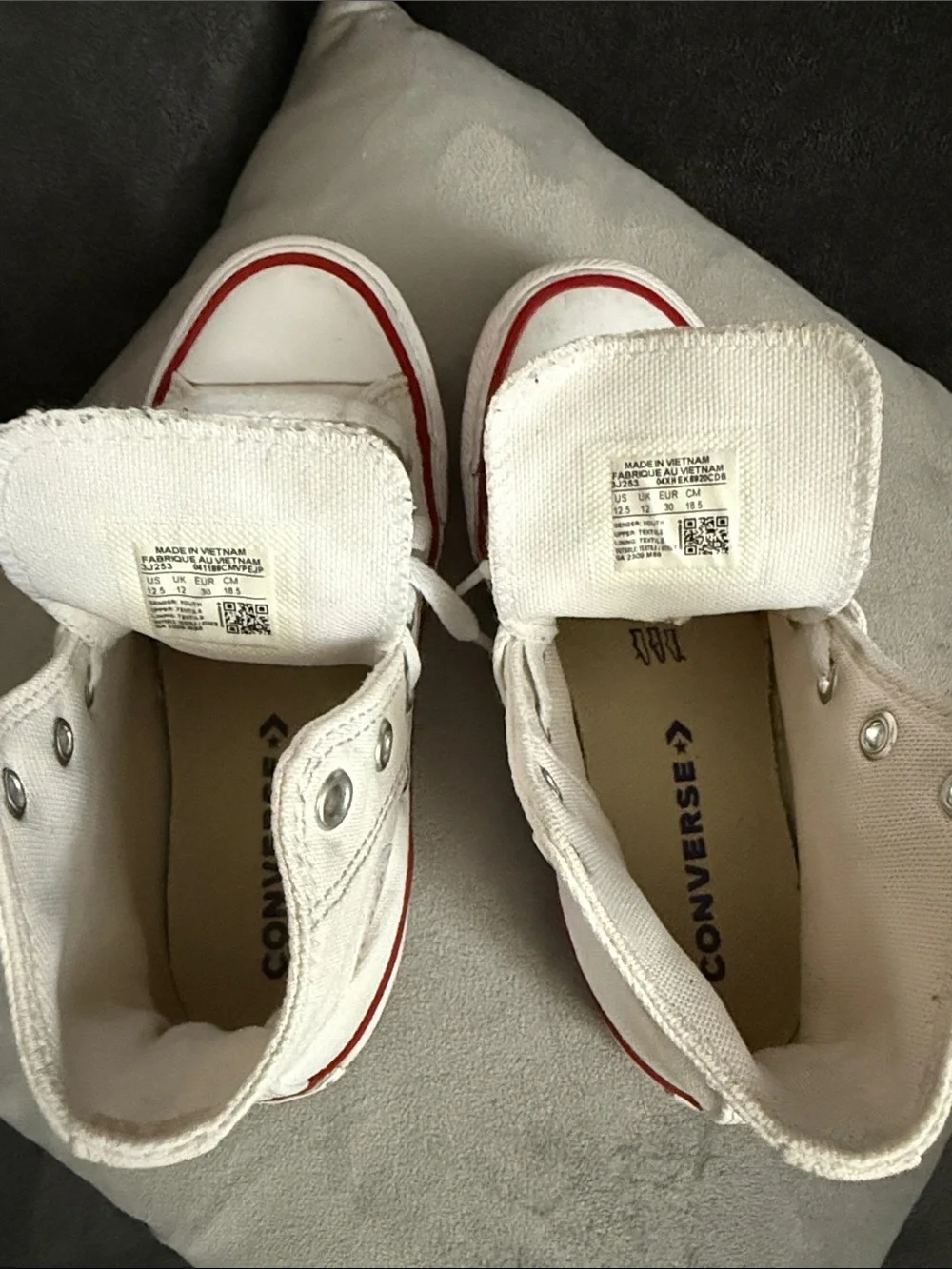 Converse White High-Top Sneakers with Red Trim and Blue Star